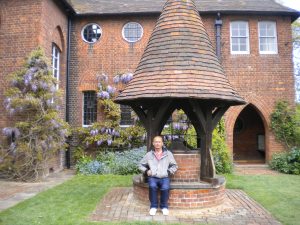 Me sat by William Morris' famous well in the garden